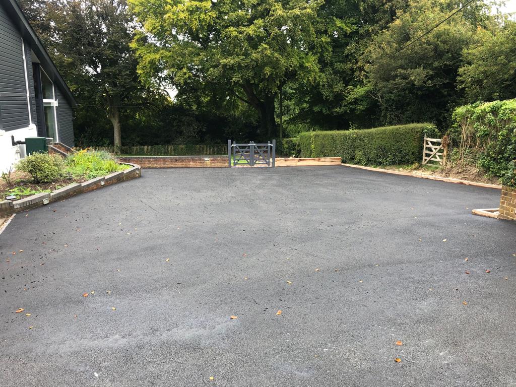 This is a photo of a bitumen driveway which is in the process of being installed by Quirindi Road Tek